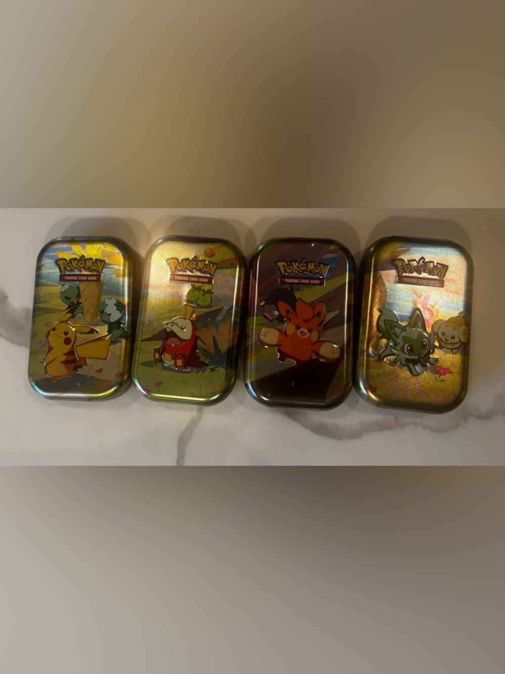 Pokémon Trading Card Game 4 Metal Mini Tins – empty. Damages posted